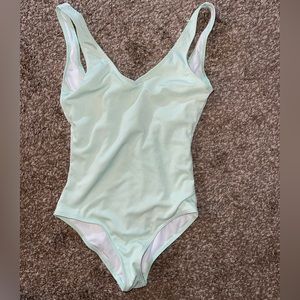 Open back mint green swimsuit comes with a wrap around for waist